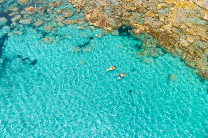 Guided Day by Boat in Carloforte With Snorkeling and Aperitif - Snorkeling Experience