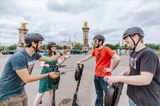 Guided Electric Scooter Tour of Paris - Visiting Notre-Dame Cathedral