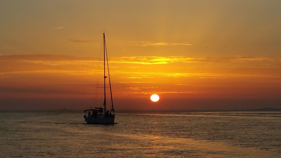 Lisbon: Private Sunset Cruise With Portuguese Wine - Discovering Lisbons Historic Quarters