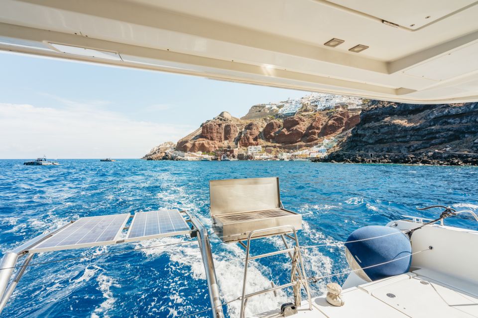 Santorini: Luxury Catamaran Day Trip With Meal and Open Bar - Inclusions and Exclusions