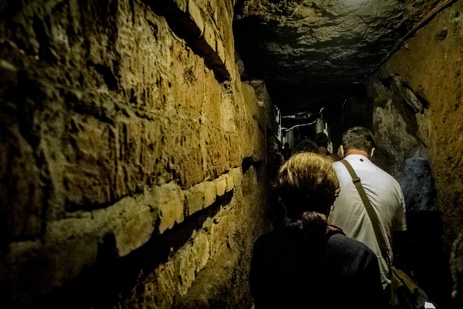 Secret Rome Basilicas and Hidden Underground Catacombs Tour - Descending Into the Catacombs