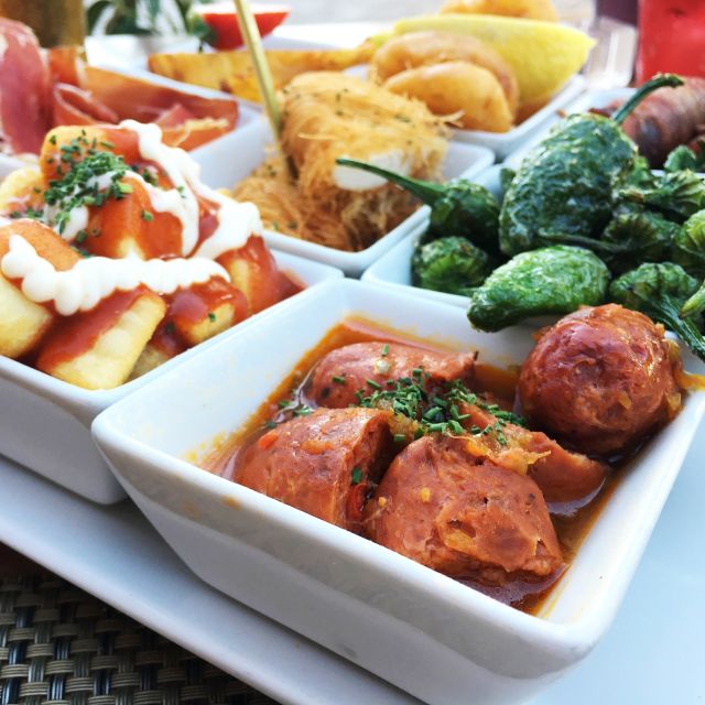 Seville: 3-Hour Guided Tapas Tour in Seville - Meeting Point and Tour Logistics