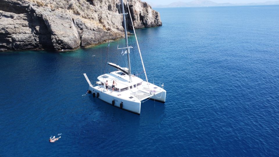 Athens Full-Day Cruise With a Sailing Catamaran - Onboard Amenities and Activities