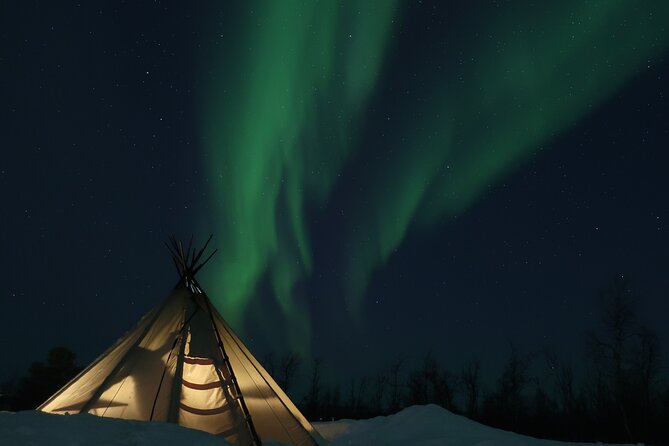 Enjoy the Aurora Show on Top of the Mountain Inc Tipi Dinner - Snowmobile Adventure