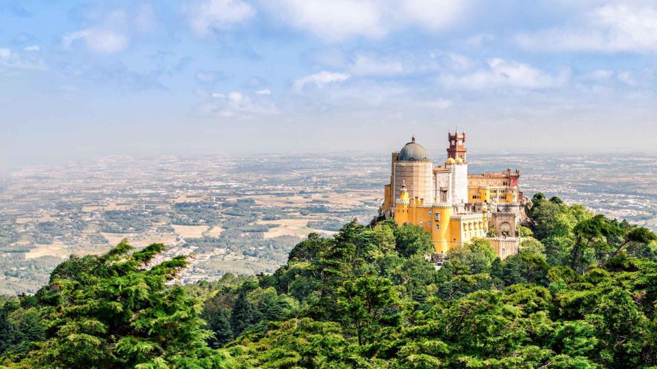 From Lisbon: Pena Palace, Regaleira, Sintra & Cascais Tour - Visit Guincho Beach