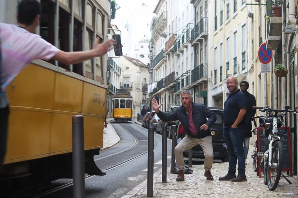 Lisbon: Portuguese Petiscos Tasting Tour by E-Bike - Cycling Through Historic Neighborhoods