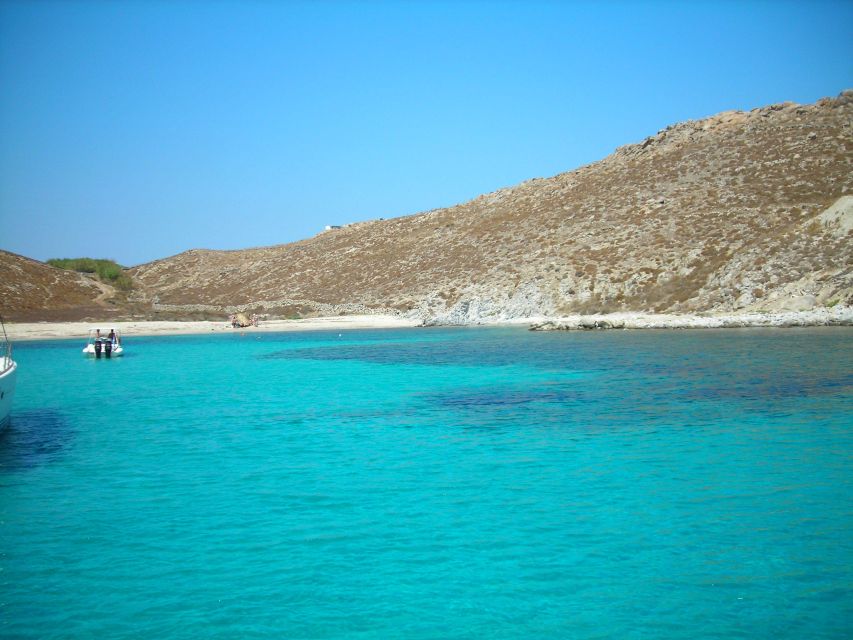 Mykonos: South Beaches & Rhenia Yacht Cruise With Transfers - Onboard Dining and Activities