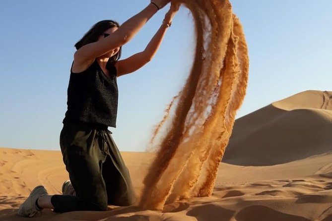 PRIVATE Dubai Desert Safari With BBQ Dinner, Camel Ride, Sand Boarding & Shows - Group Size and Pricing