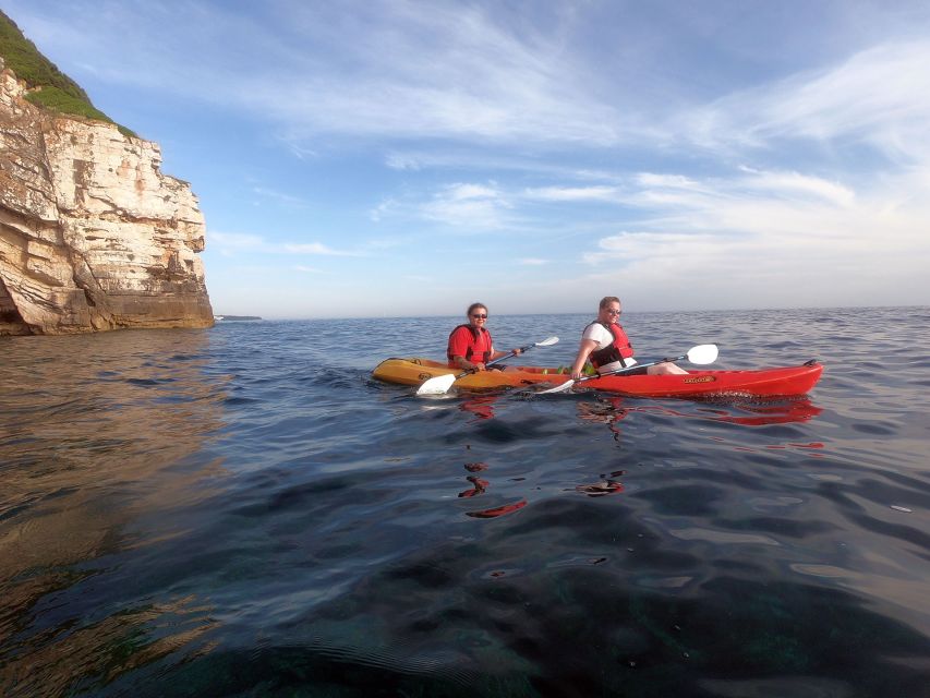 Pula: Sunset Kayak Tour With Snorkeling and Cliff Jumping - Exploring Caves and Beaches