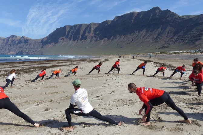 Surf Class in Famara 9:15 AM - 12:00 PM or 11:45 AM - 2:30 PM (2-Hour Class) - What to Bring