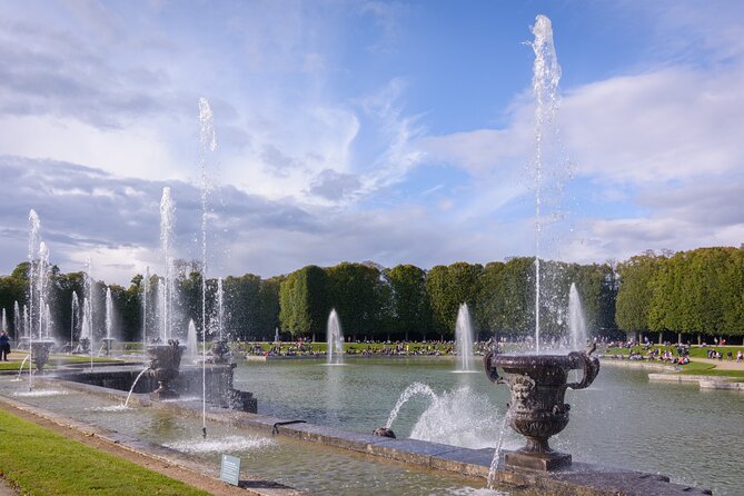 Versailles Palace Audio-Guided Tour by Shuttle From Paris - Visitor Experiences