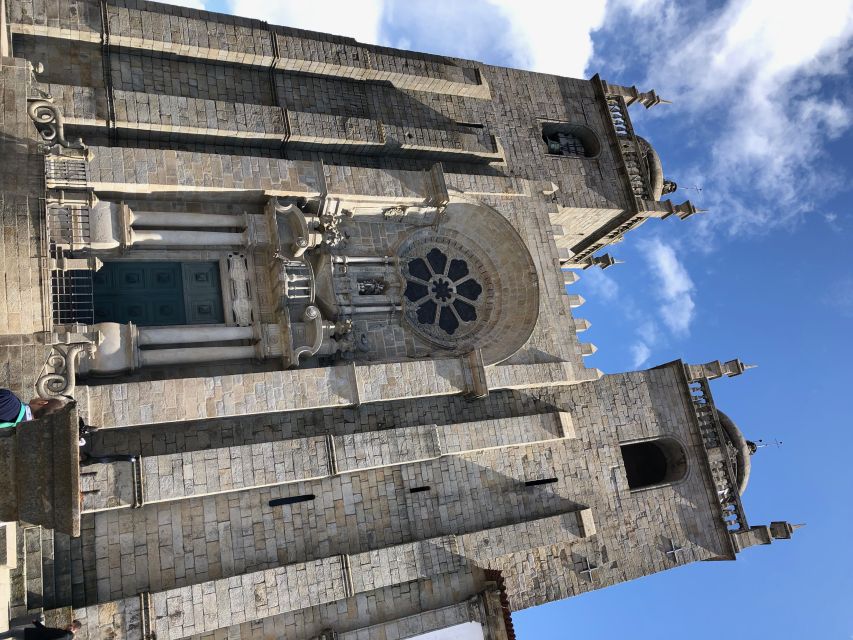 Porto: Guided City Walking Tour & Port Wine Cellar - Explore Portos Historical City Center