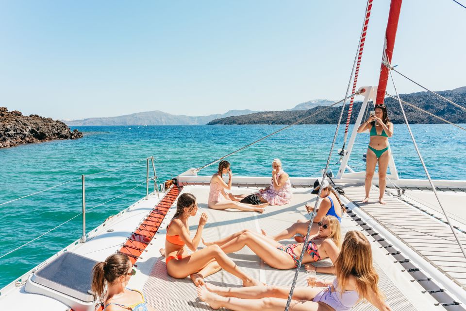 Santorini: Catamaran Tour With BBQ Dinner, Drinks, and Music - Duration and Departure Details