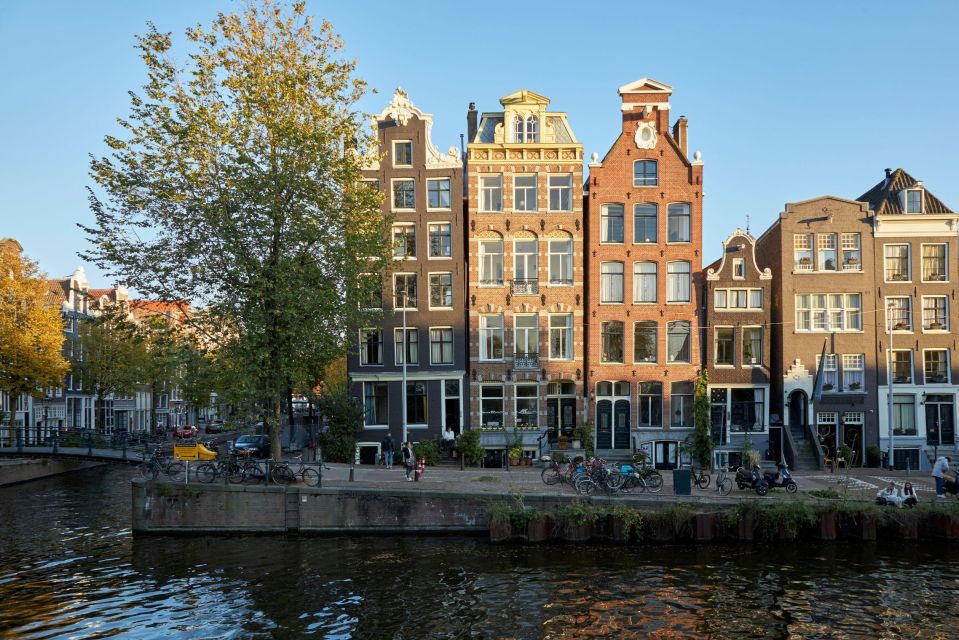 Amsterdam: Highlights & History Self-Guided Walking Tour - Key Points