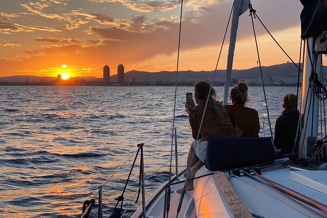 Barcelona Sunset Cruise With Open Bar of Cava & Local Champagne - Key Points