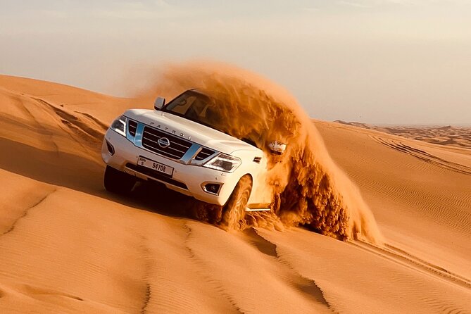 Dubai: Desert Safari Premium Dinner Quad Bike Camel and Sandboard - Key Points