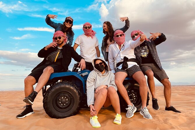 Dubai Red Dunes Quad Bike Tour,Sandboard, Camel Ride & BBQ Dinner - Key Points