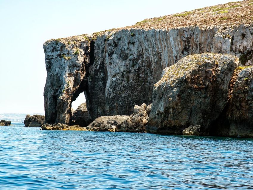 From Gozo:Around Comino, Blue Lagoon, Crystal Lagoon & Caves - Key Points