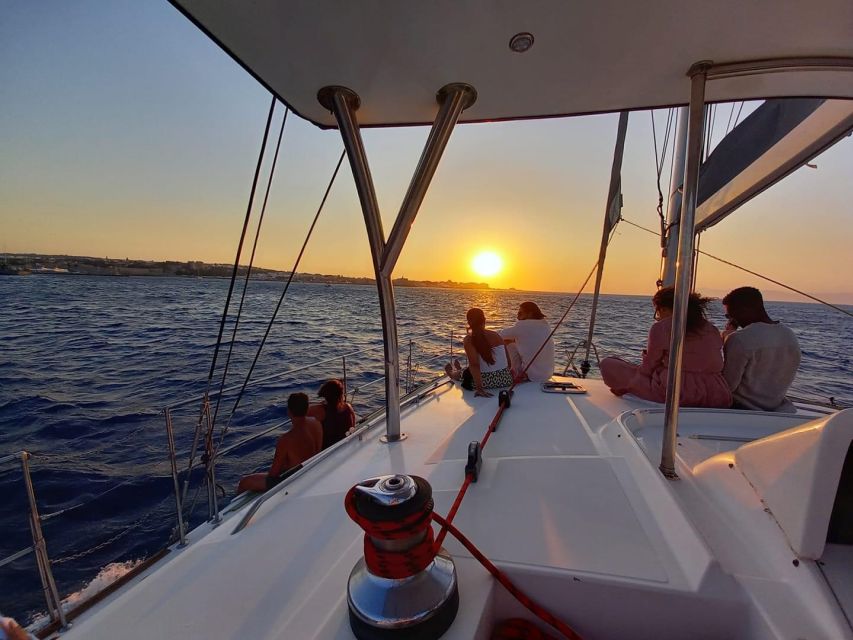 From Rhodes: Private Catamaran Sunset Cruise All Inclusive - Key Points