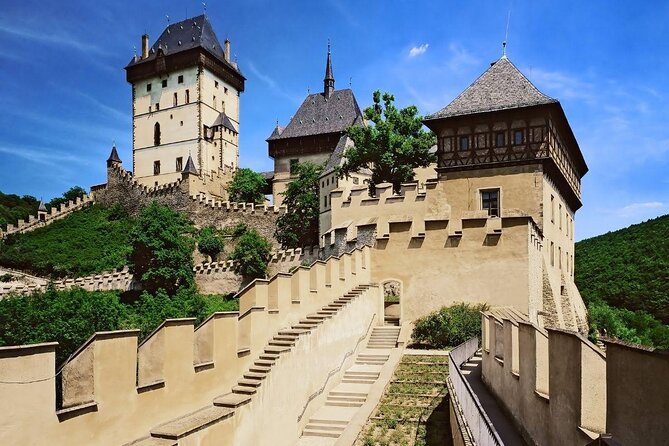 Karlstejn Castle in Vintage Convertible Car - Key Points