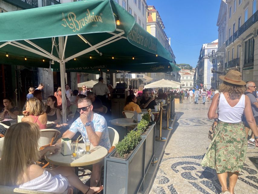 Lisbon: Baixa and Chiado Districts Self-Guided Walking Tour - Key Points