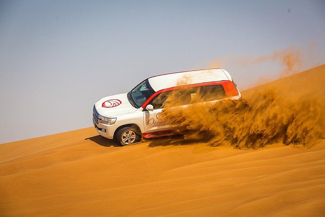 Morning Red Dunes With Camel Ride, Sandboarding and Refreshments - Key Points