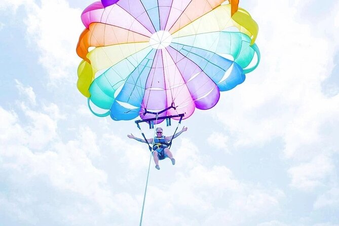 Parasailing, Blue Hole Mineral Spring, Seven Mile Beach - Location and Tour Details