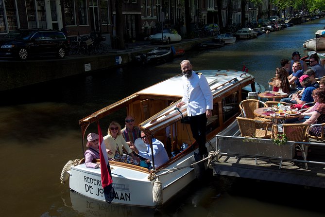 Private Guided Historic Amsterdam Canal Cruise in a Salon Boat - Experience Overview