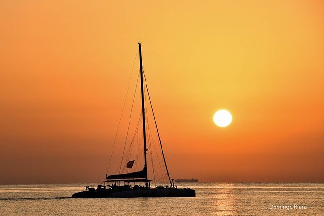 Sunset in Denia From the Catamaran Mundo Marino - Key Points