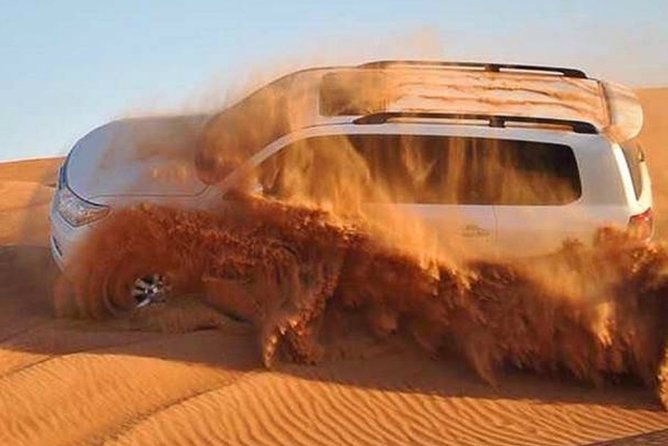 Dubai Desert Safari With Camel Riding, Sand Boarding,Bbq Dinner and 3 Live Shows - Thrilling Activities in the Arabian Desert