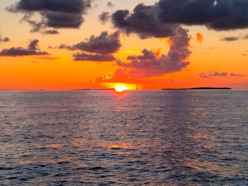 Key West: Private Tiki Boat Sunset Cruise - Highlights