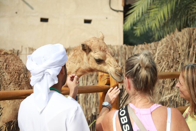 Walk in Old Dubai With New Friend(Pickup Option From Hotel) - Dhow Boat Ride on Dubai Creek