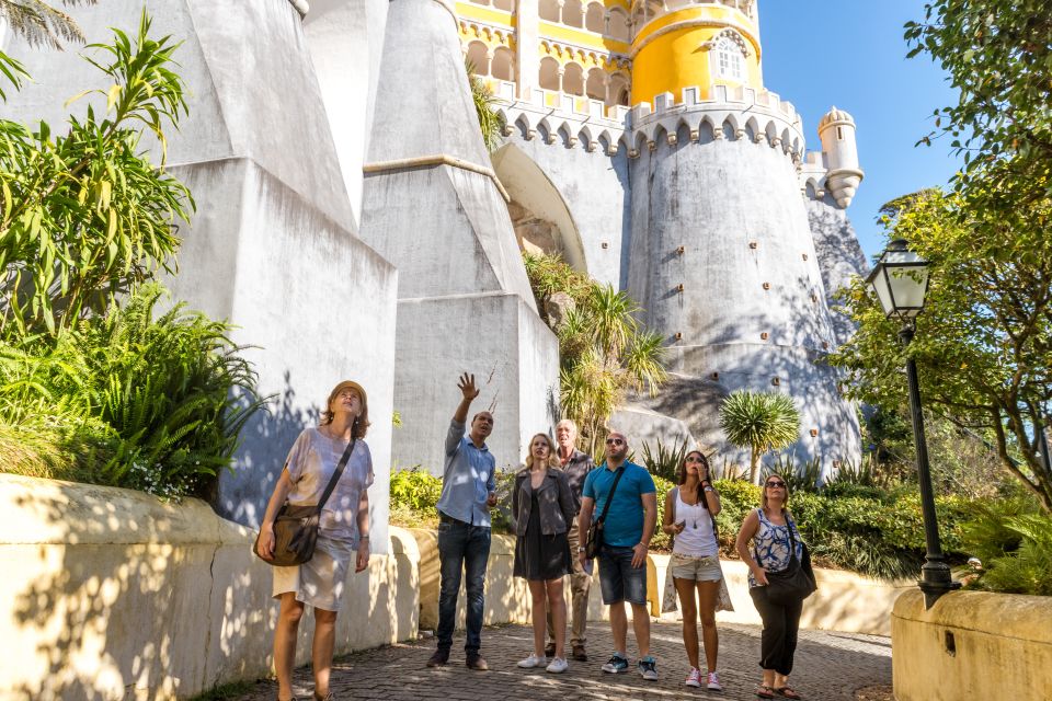 From Lisbon: Sintra and Cascais Day Trip With Pena Tickets - Multilingual Guide Options