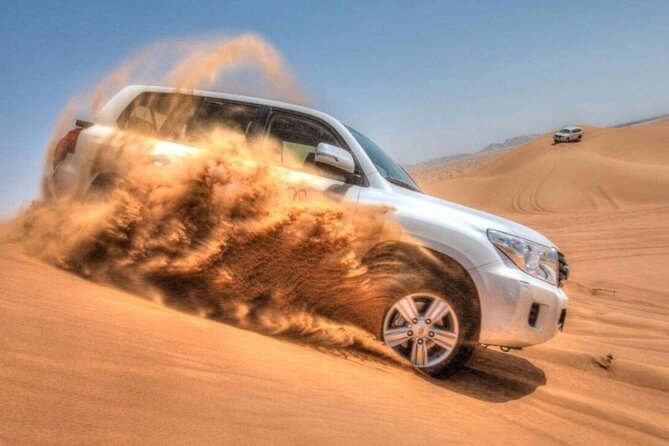 Dubai Desert Safari With Camel Riding, Sand Boarding,Bbq Dinner and 3 Live Shows - Key Points