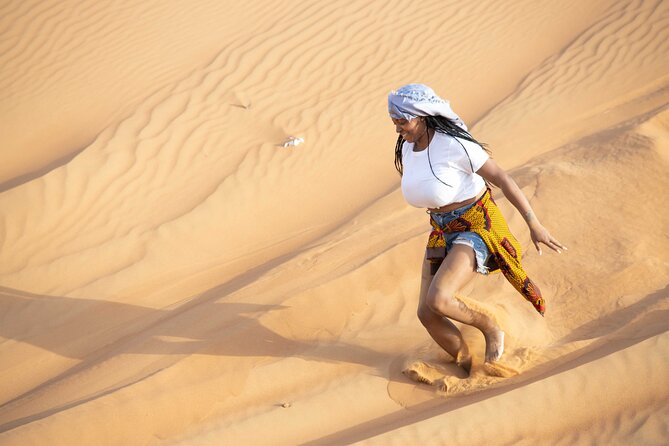 Dubai Half-Day Red Dunes Bashing With Sandboarding, Camel &Falcon - Overview and Highlights