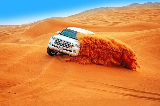 Evening Desert Safari With BBQ Buffet Camel Ride and Arabic Shows - Thrilling Dune Bashing Experience