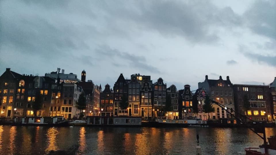 Guided Bike Tour of Amsterdam in French - Tour Overview and Pricing