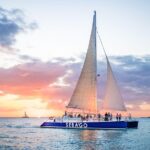 Key West Sunset Sail: Dolphin Watching, Wine, And Tapas Overview Of The Experience