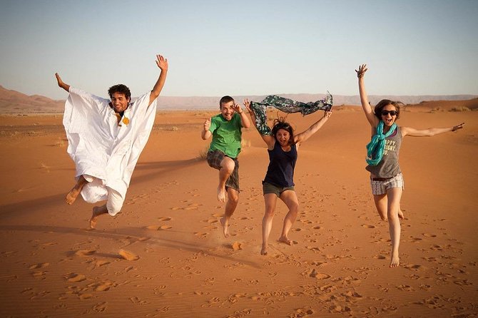 Private Red Sand Desert Safari With Camel Ride and Sand Boarding - Overview of the Experience