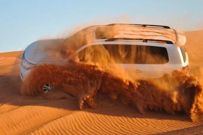 Red Dunes Desert Safari, Sand Board, Camel Ride With Bbq Dinner In Premium Camp Overview Of The Experience