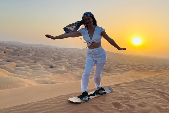 Sunrise Desert Safari With Sand Boarding and Camel Ride - Sunrise Spectacle in the Dunes