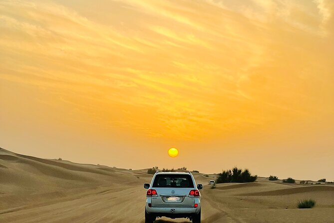 Sunset Safari With Bbq Dune Drive Camel Ride & Dune Buggy Option Dune Driving Experience