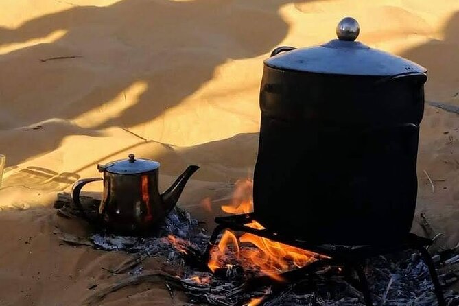 2 Days Tour to Douz & Ksar Ghilan Oasis. and an Overnight in the Sahara Under Bedouin Tent .. Dinner in the Camp, Private Jeep - With English Speaking Guide. - Pickup and Meeting Information