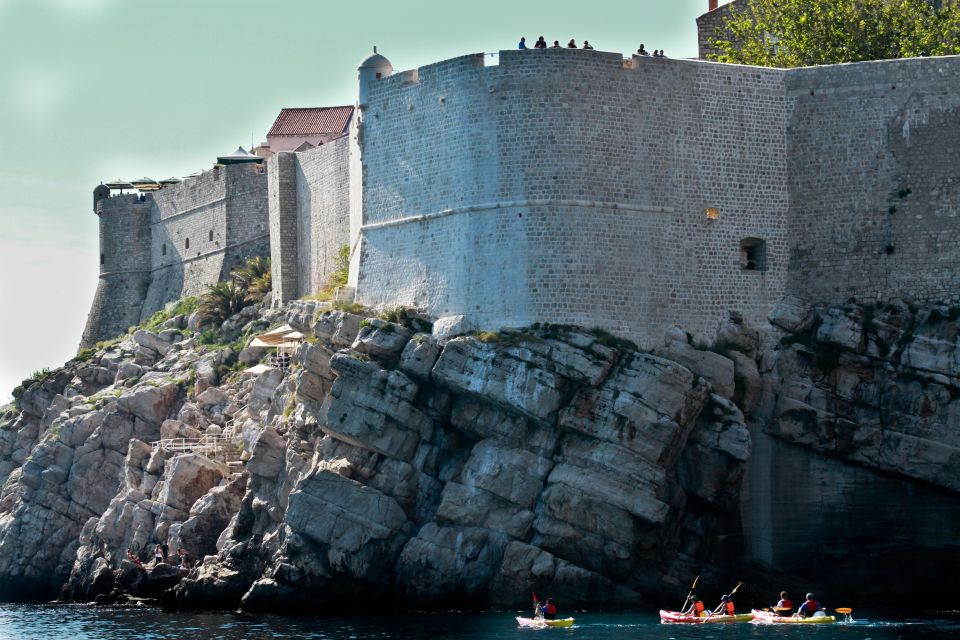 Dubrovnik: Sunset Sea Kayaking Tour With Fruit Snack & Wine - Itinerary and Activities