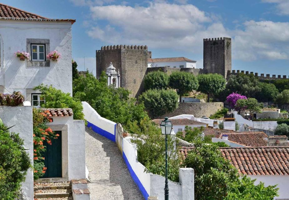 From Lisbon: Big Waves Nazare, Obidos & Batalha - Guided Tours and Languages