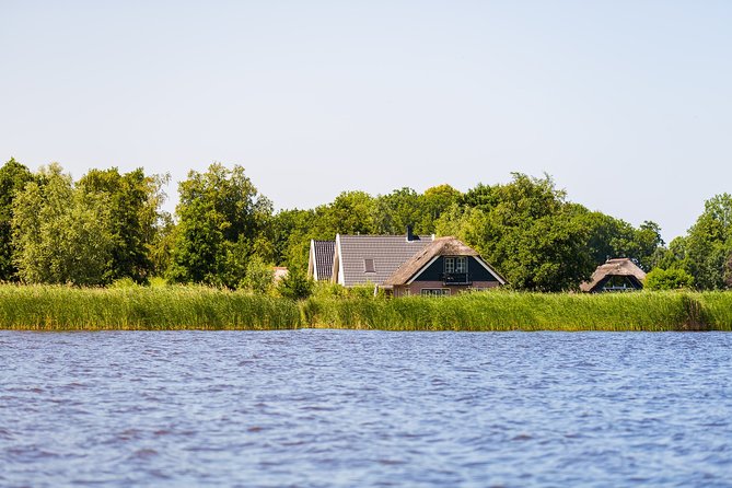 Giethoorn and Afsluitdijk Day Trip From Amsterdam With Boat Trip - Inclusions