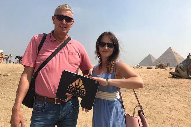 Top Rated Giza Pyramids and Sphinx Tour From Cairo Airport - Transportation and Guide