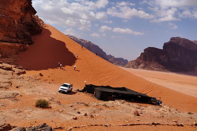 Wadi Rum Day Tour & Starlight Cave & Traditions Food - Dinner and Overnight