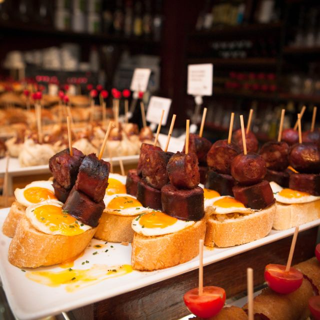 Barcelona: Food & Drink Tasting Tour in Traditional Taverns - Meeting Point and Accessibility