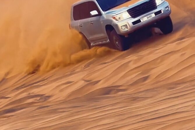 Evening Desert Safari With BBQ Buffet Camel Ride and Arabic Shows - Camel Ride in the Desert